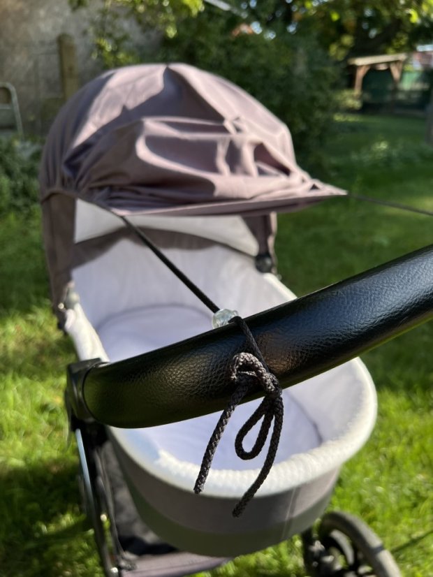 Sluneční clona na kočárek mléko